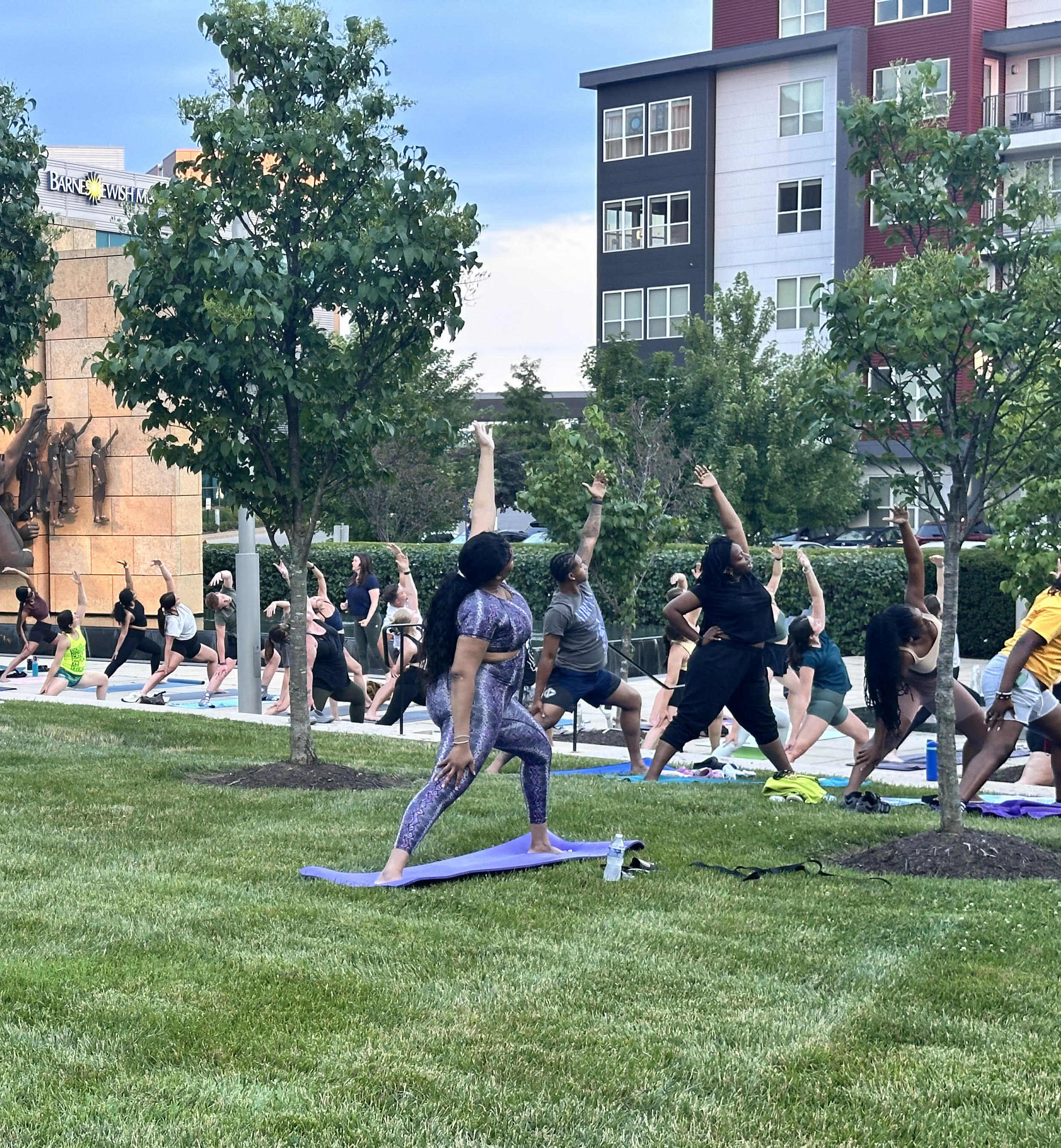 People doing yoga outdoors