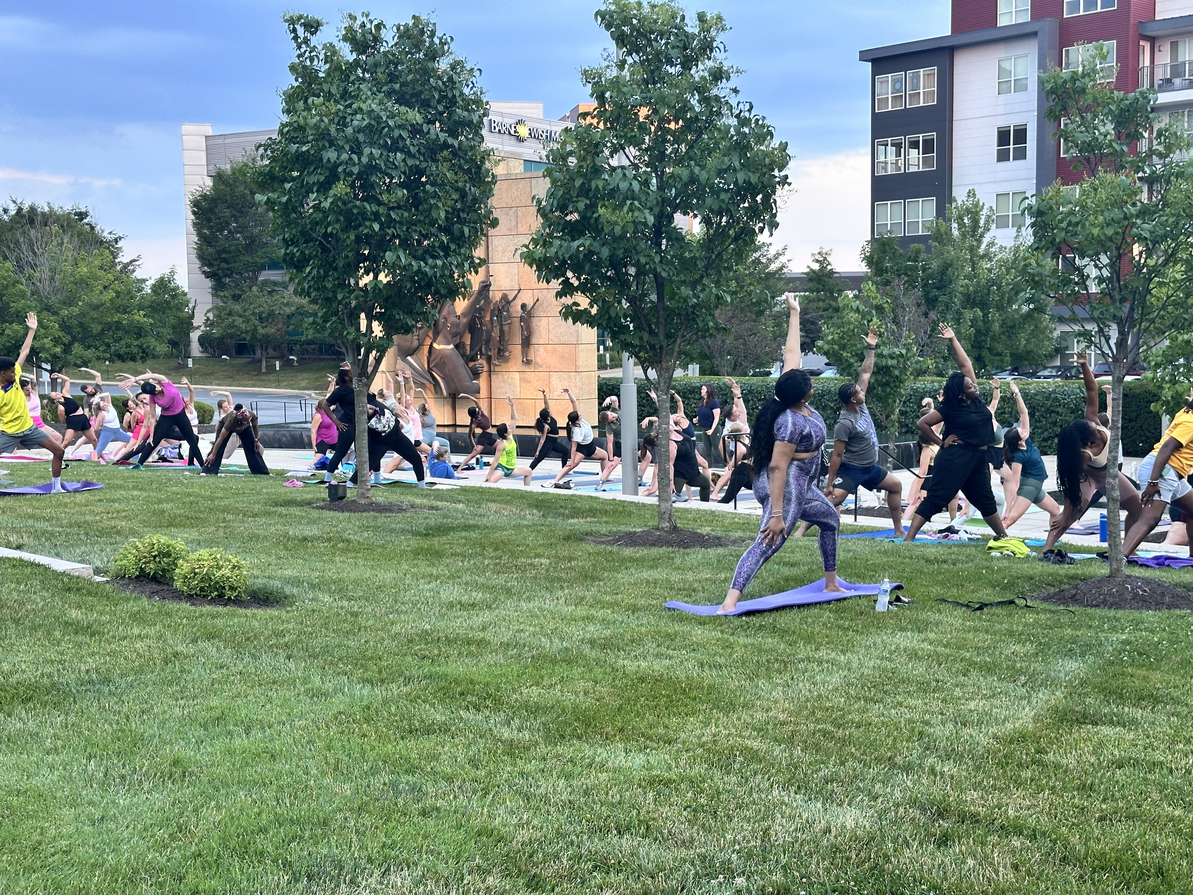 People doing yoga outdoors