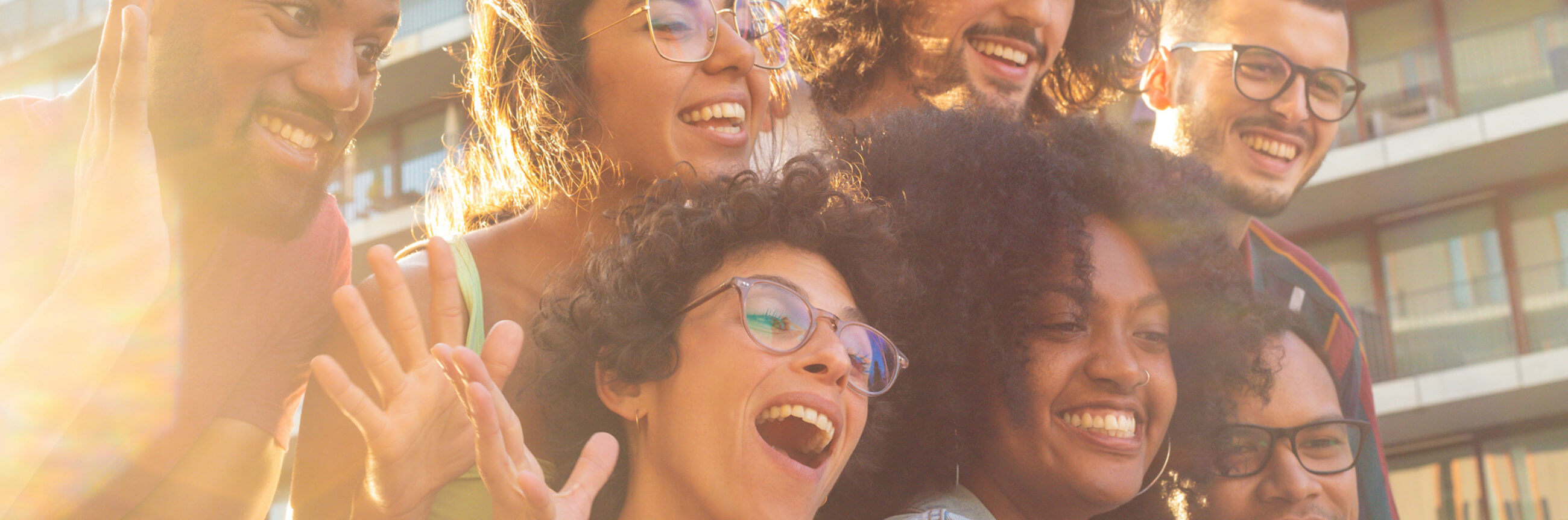 Group of smiling friends taking a selfie